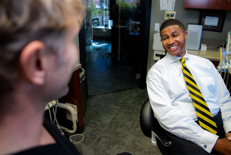 Derrick, A Full Mouth Cosmetic Restoration Patient, Far Shot Of His Smile