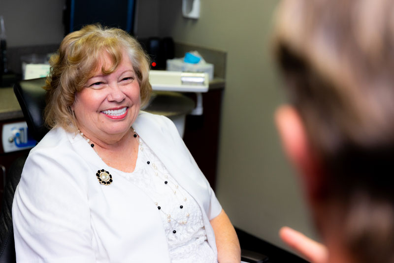 Patty, An All On 4 Dental Implants Patient, Smiling During Her Consultation