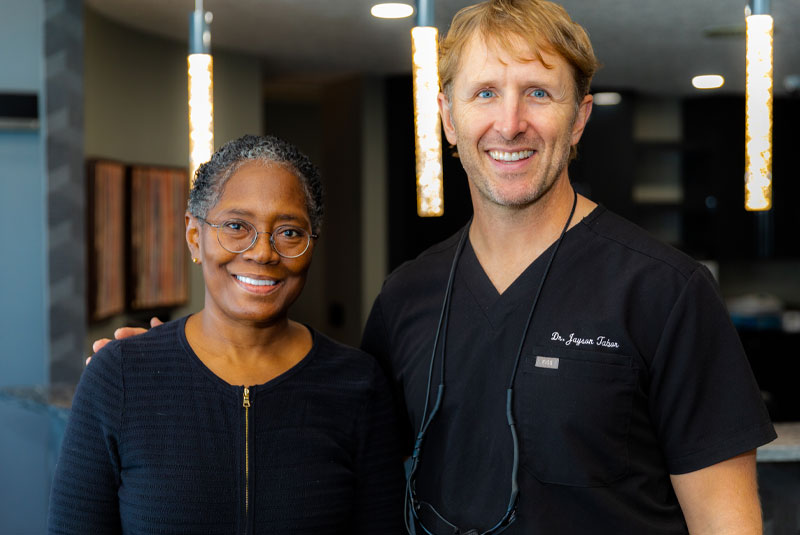 Sandra, An All On 4 Dental Implant Patient, Smiling With Dr. Tabor