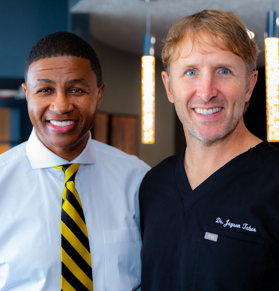 dr tabor and dental patient smiling