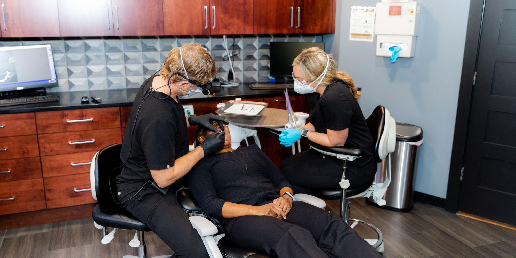 dr tabor performing dental implant procedure