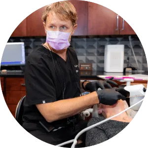 dr tabor performing crown procedure